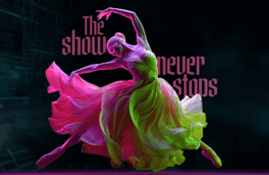 Neon-lit ballerina mid-leap in a flowing pink-to-green dress, arms gracefully arched, against a dark digital grid background. Large pink text overlay reads "The show never stops".